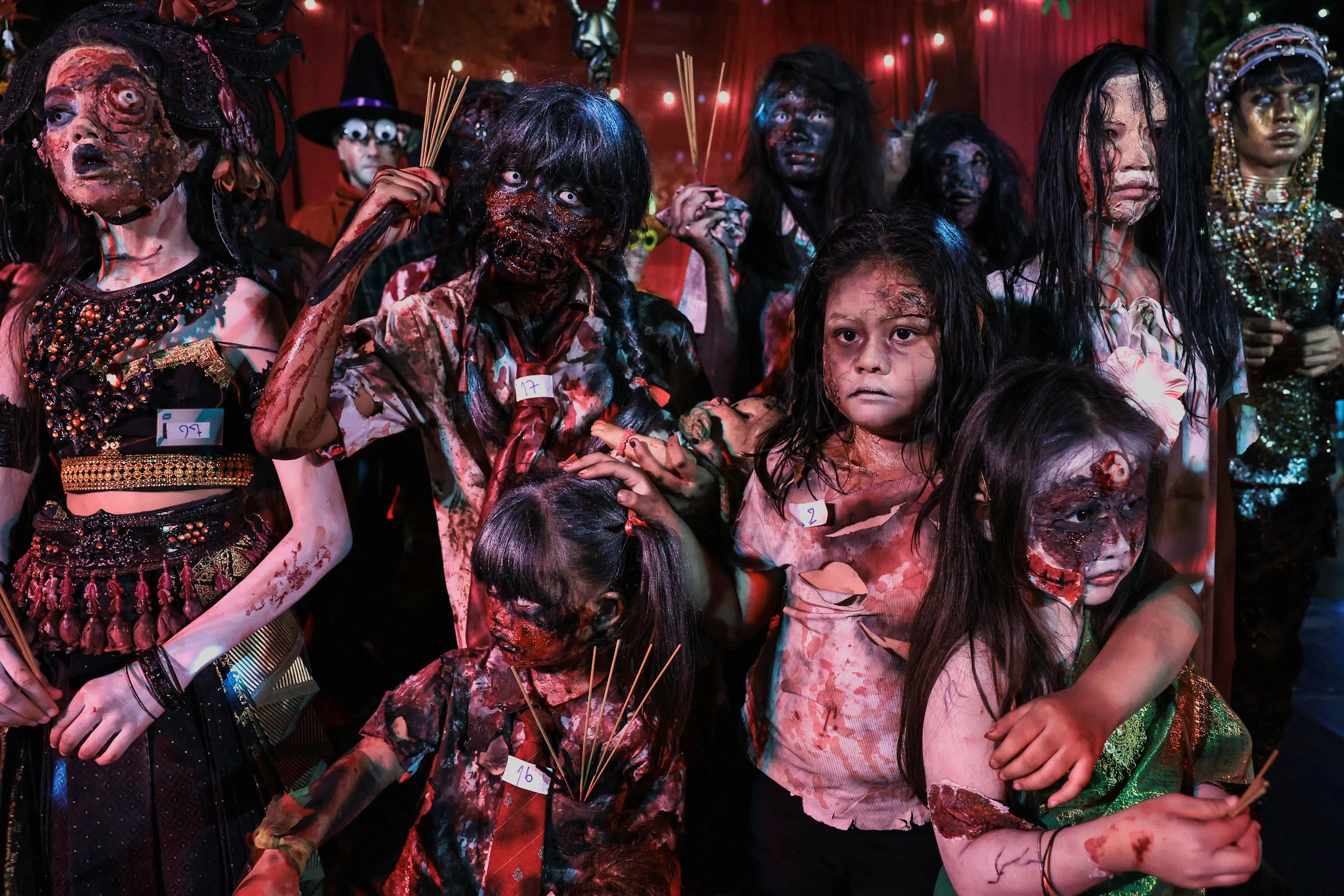 People take part in a Halloween costume contest in Bangkok, Thailand, October 24, 2026. REUTERS/Chalinee Thirasupa TPX IMAGES OF THE DAY