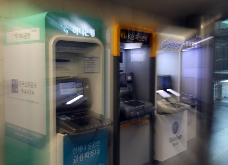 ATMs are seen inside a building in Seoul, Wednesday. Yonhap