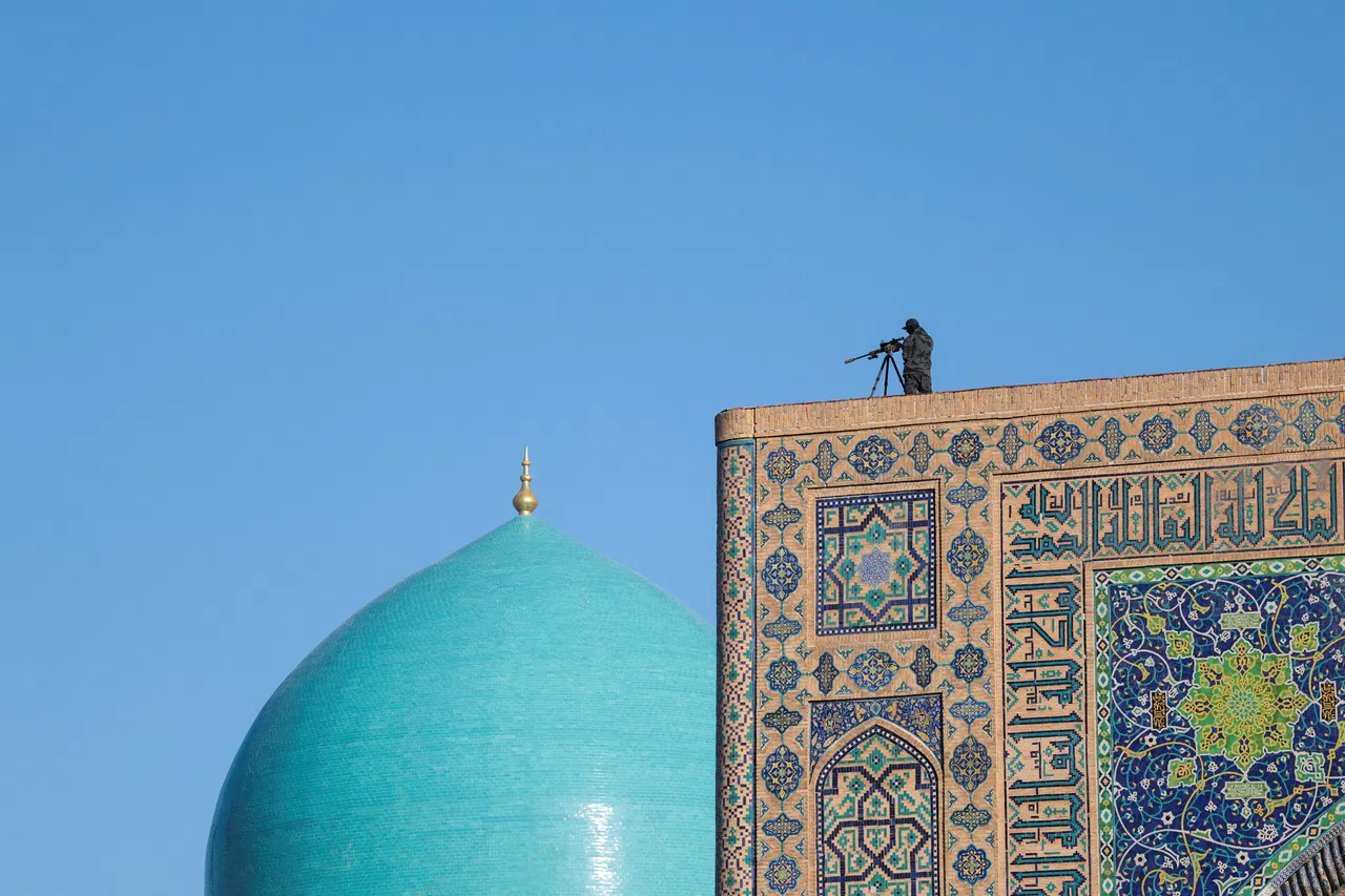 A sniper takes position to secure the area on the day US Secretary of State Marco Rubio tours Registan Square, in Samarkand, Uzbekistan, October 19, 2026. REUTERS/Kylie Cooper/Pool TPX IMAGES OF THE DAY